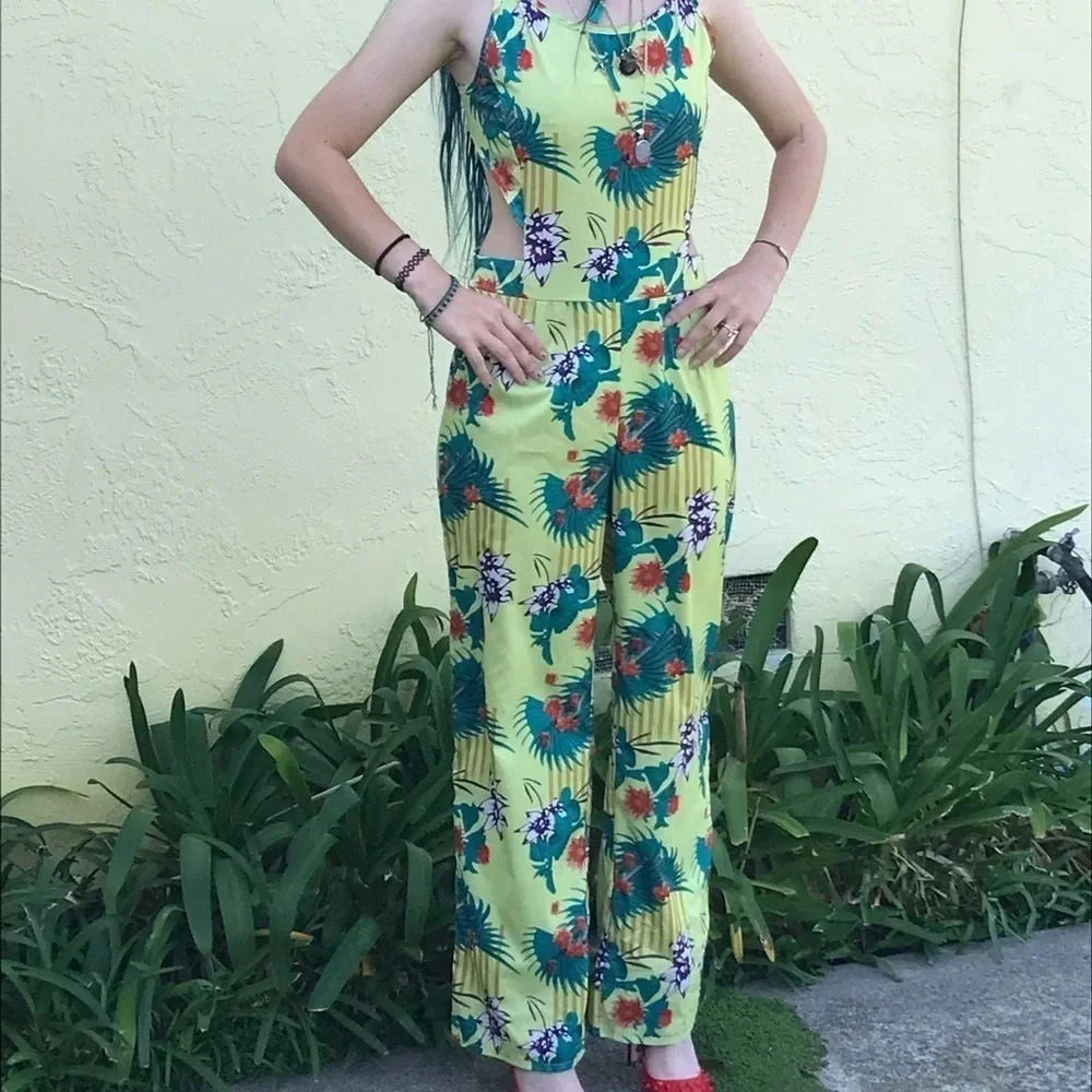 𝅺TROPICAL print jumpsuit cut out sides ties in back sexy slinky NEW size S